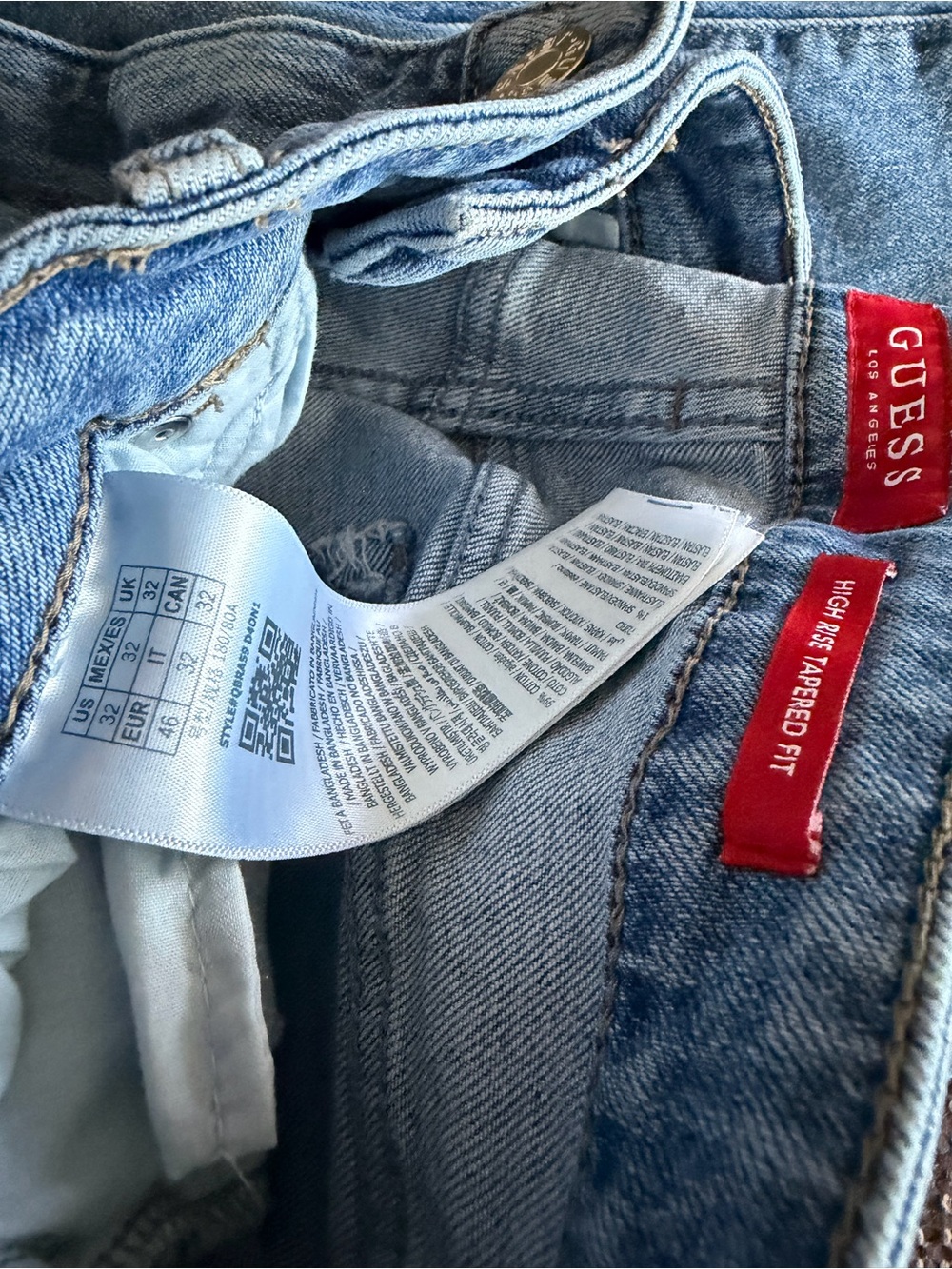 GUESS Light Blue High Rise Tapered Jeans with Red Logo Tabs